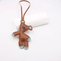 Brown cartoon leather bear charm with light blue trim and long hanging strap - Cartoon Character / Brown Blue Accent