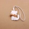 Close-up of white leather cat charm with brown bow and precise edge stitching - Lanyard Bow Cat / White