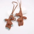 Brown leather horse bag charm with light blue accents and a thin lanyard strap - Horse Shape Style / Brown Blue Accent