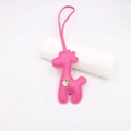 Detail of rose pink PU leather giraffe bag charm with neat stitching and gold chain - Rose Red