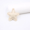 Detail of a beige star-shaped leather pendant with fine stitching and soft texture for DIY - Star Accessories / Off-white