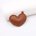 Brown heart-shaped leather charm with litchi texture and neat stitching for DIY bags - Brown