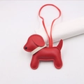 Detailed view of red leather puppy bag charm with white collar and stitching - Red - Beige Collar