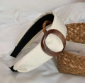 Detail of cream fabric headband with brown tortoise resin buckle on white background - Beige