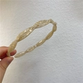 Cerchietto a spirale in acetato con elegante trama marmo crema e struttura flessibile - Beige Fantasia (C-1184-1)