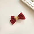 Close-up of a burgundy velvet bow hair clip with golden heart and pearl details - Red Satin Ribbon Bow Clip