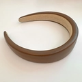 Detailed view of wide brown PU leather headband with fine texture and non-slip lining - Brown