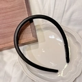 Elegant black satin handmade headband for women with premium silk texture on white ceramic plate - Fine Style / Black