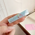Detail of light blue hair clip with butterfly sequins and sparkling silver glitter finish - Light Blue Rectangle Butterfly Style (D-4401-5)