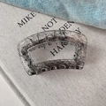 Detail of elegant rectangular lace-patterned hair claw clip with silver metal spring - Black Trapezoid Style (D-5369-2)