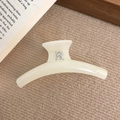 Creamy acrylic hair claw clip with PR silver letter ornament on textured background - Apricot (D-5209-1)