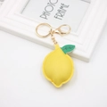 Portachiavi a forma di limone in pelle PU gialla con foglia verde e chiusura in metallo oro - Limone Giallo