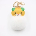 Close-up of cute cartoon tiger plush keychain with white pom-pom and gold metal clasp - Gold Keychain / White