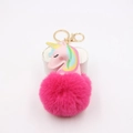 Detail of cute unicorn pom-pom keychain with pink plush ball and golden lobster clasp - Rose Red