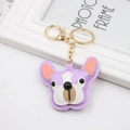 Close-up of a purple PU leather French Bulldog keychain with gold lobster clasp and ring - Bulldog / Taro Purple