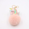 Portachiavi unicorno con pompon in ecopelliccia rosa, ciondolo in pelle e gancio dorato - Rosa