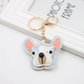 Close-up of laser silver PU leather French bulldog keychain with golden metal clasp - Bulldog / Silver