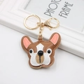 Detailed view of handmade brown and white leather bulldog keychain with gold metal clasp - Bulldog / Coffee