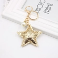 Sparkly gold star keychain with glitter surface and white faux pearl bag charm accessory - Gold Star