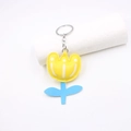 Charmante tulp bloem lederen sleutelhanger met gele bloemblaadjes en blauwe steel - Narcis Sleutelhanger / Geel