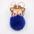 Detail of cute reindeer plush pom-pom keychain with golden lobster clasp on white pedestal - Sapphire Blue