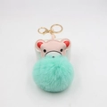 Detail view of pink bear leather charm and mint green faux fur pompom for keychain - Mint Green