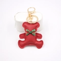 Detail of red bear leather keychain with plaid bow and gold lobster clasp - Bear Charm / Red