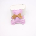 Detail of pink leather bear charm with brown bow and white stitching for DIY crafts - Taro Purple