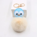 Cute leather octopus pom pom keychain with light blue PU head and cream plush ball - Off-white