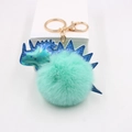 Porte-clés pompon vert menthe avec charme dinosaure bleu irisé pour sac - Vert menthe