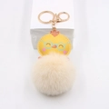 Cute cartoon chicken plush ball keychain with golden ring and fluffy faux fur pompom - Little Yellow Chick Pom-pom Pendant / Off-white