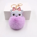 Portachiavi gatto in peluche viola con fiocco rosa e chiusura a moschettone dorata - Viola Taro