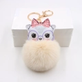 Portachiavi gatto carino in peluche con pompon giallo e anello in metallo dorato - Bianco Sporco