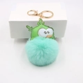 Llavero de monstruo verde de dibujos animados con pompón de pelo menta y aro dorado - Estilo de Monstruo de Dibujos Animados / Verde Menta
