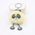 Porte-clés peluche raton laveur jaune mignon avec de longues jambes et visage de panda - Poche zippée