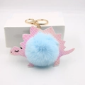 Pink and blue plush dinosaur keychain with golden hook and artificial fur ball charm - Light Blue