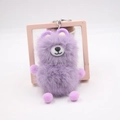 Detailed view of a purple plush bear keychain with soft fur and silver metal ring - Taro Purple