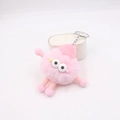 Cute pink plush monster keychain with spring legs and knit hat for car or bag - Light Pink