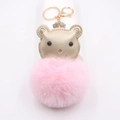 Porte-clés ours doré avec pompon en fourrure rose et anneau en métal brillant - Rose Clair