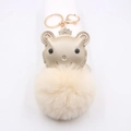 Champagne gold crown bear keychain with large beige plush pompom and gold lobster clasp - Off-white