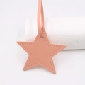 Close-up of pink star-shaped PU leather pendant with detailed stitching on white background - Star Lanyard / Pink