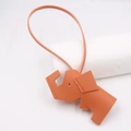 Close-up of orange elephant leather charm with fine hand-stitching and slim lanyard - Lanyard Elephant Pendant / Orange
