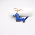 Detailed blue leather dachshund keychain with golden ring and fine stitching detail - Sapphire Blue