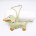 Detail of dachshund bag charm in sage green leather with orange accents and white stitching - Hanging Organizer Style / Matcha Green