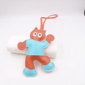 Detailed view of an orange leather cat charm with blue clothes and fine contrast stitching - Orange Blue