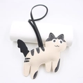 Cute cow pattern cat leather backpack charm with black lanyard and white stitching details - Cream