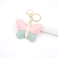 Chic butterfly leather keychain with pink and mint green patchwork and gold clasp - Pink Series