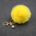 Close-up of fluffy yellow faux fur keychain with gold lobster clasp and rhinestone ball - (Rhinestone Ball) Faux Rabbit Fur-8CM / Yellow