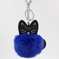 Close-up of royal blue faux fur pompom and black PU leather cat head keychain hook - 8cm Faux Rabbit Fur / Sapphire Blue