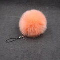Detail of soft 8cm faux rabbit fur pom pom keychain with silver lobster clasp - 8cm Faux Fur + Strap / Orange Red